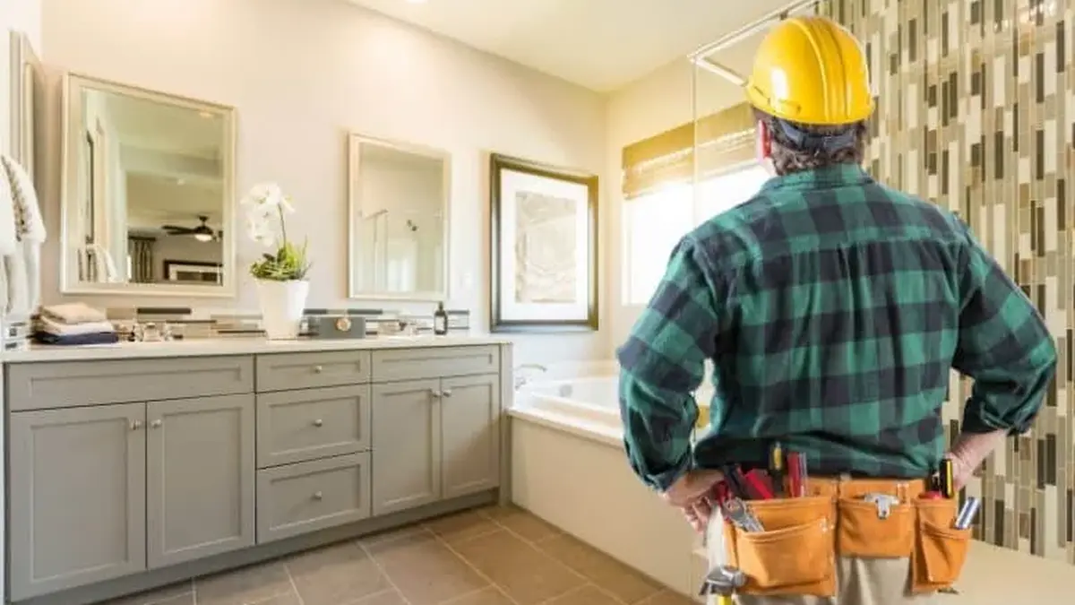 home renovation experts taking a final look after work