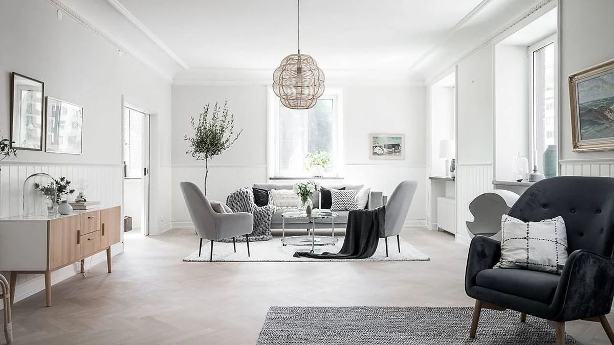 Living room with pale walls and white trim, used here as a paint sheen guide example