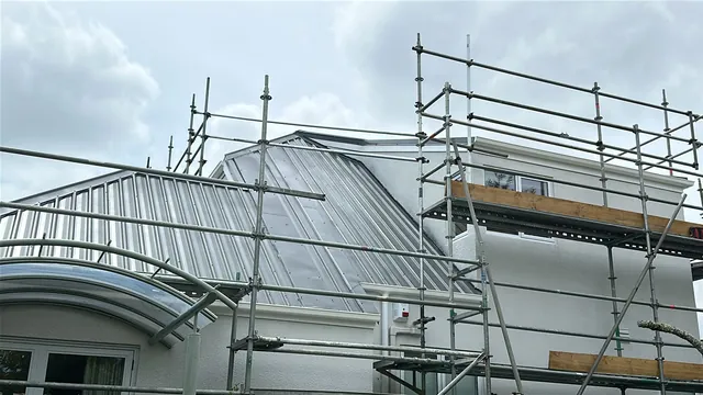 Completed upper roofline, Kumeu Upper roofline of a Kumeu home showing the completed metal fascia and gutter after a Taylor fascia conversion by My Homes Construct Ltd