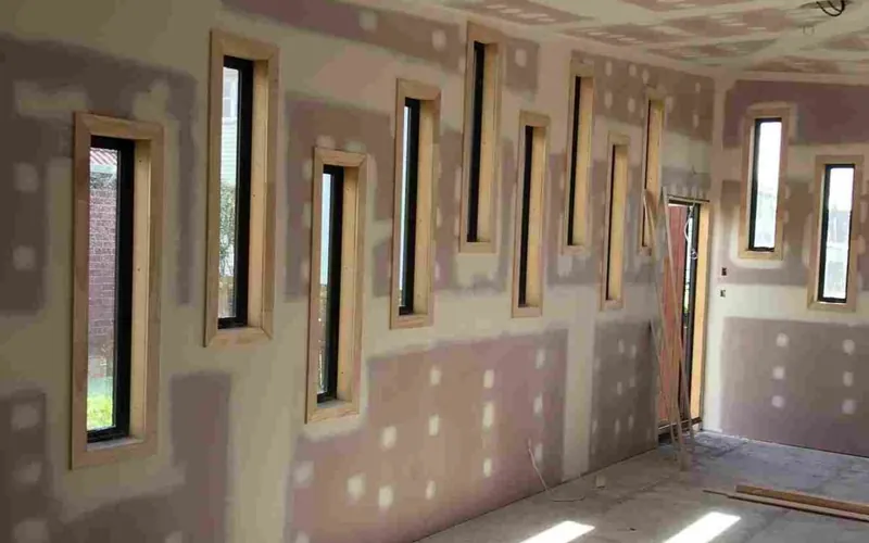 Interior of an Auckland home part-way through a full renovation, lined and ready for finishing, by My Homes Construct Ltd
