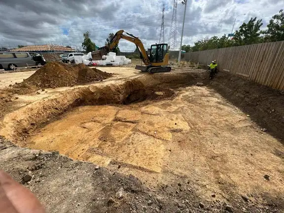 Excavation and earthworks with a digger in progress on an Auckland property