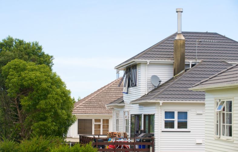 a white color house i n auckland with total house renovation