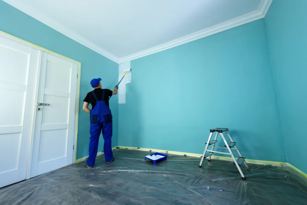 a guy doing interior painting in room Auckland