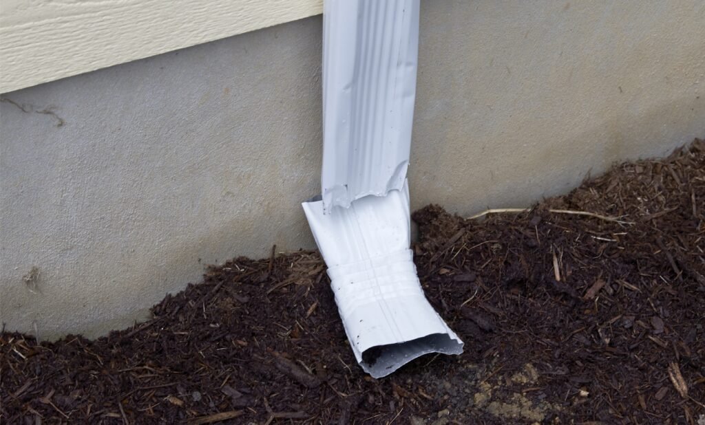 how to fix dented gutter downspout in Auckland NZ